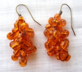 Orange beaded earring